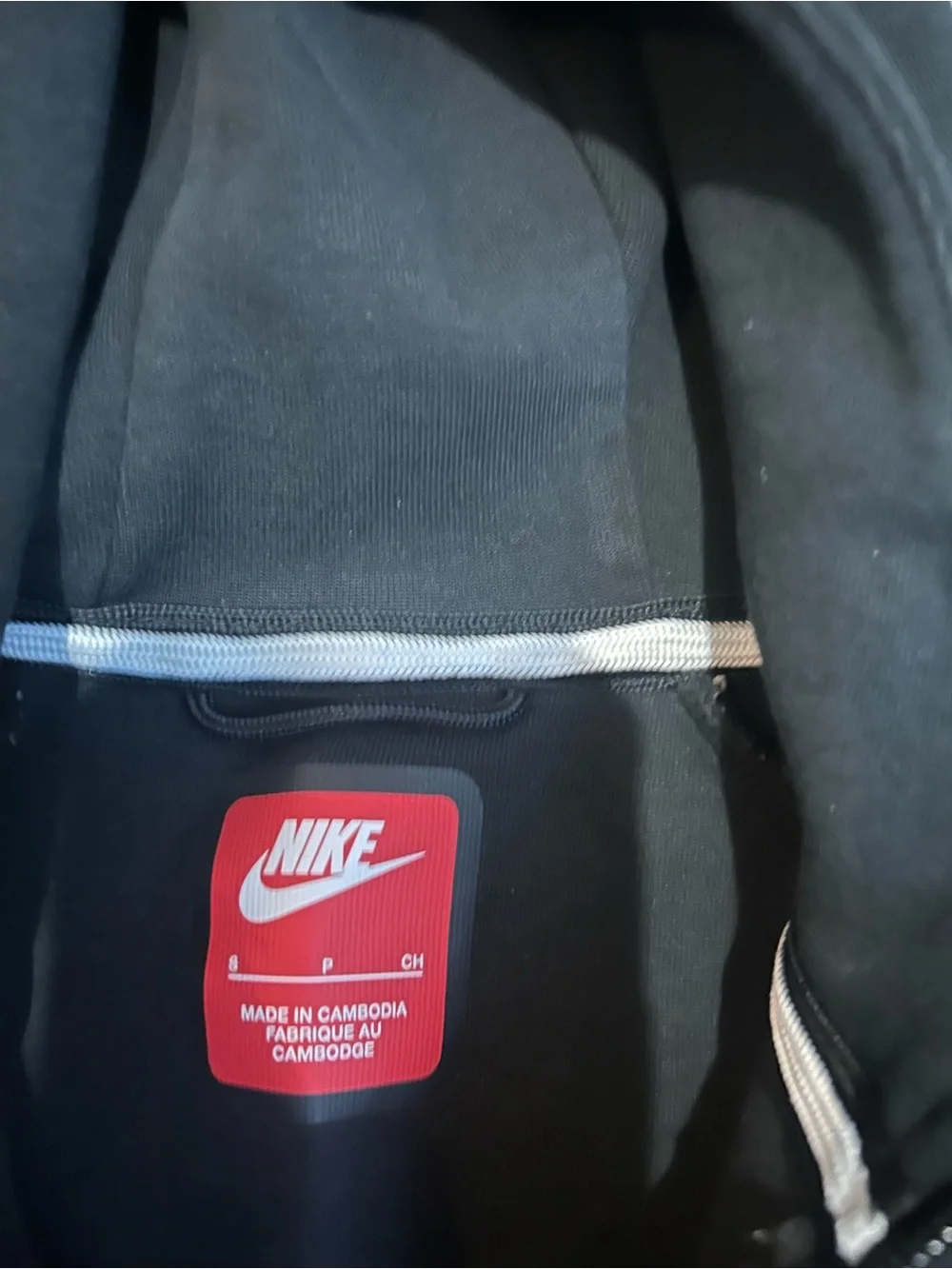 Nike Kids Black Hooded Performance Jacket with Chevron Trim